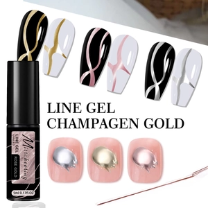 Macro detail of metallic rose gold nail line gel and brush for UV LED nail art design
