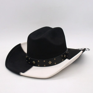 Vintage western cowboy hat in black and white suede with decorative rivet leather band