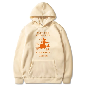 Halloween beige hoodie with witch riding a broom and I Can Drive A Stick slogan