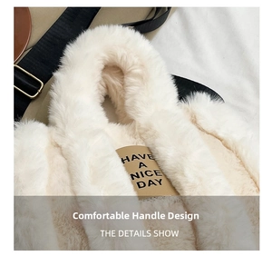 Detail view of the soft white plush texture and comfortable thick handle on this tote bag