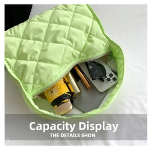 Top view of neon green quilted tote bag showing large capacity for daily items