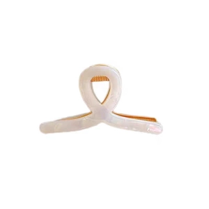 Elegant white acetate hair claw clip with golden metal teeth for women's hairstyling