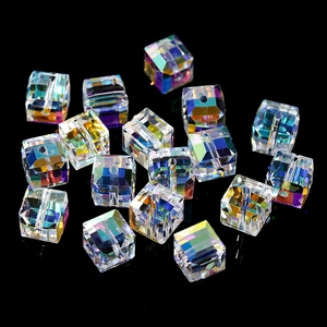 Detailed shot of cube crystal glass beads with aurora AB finish and pre-drilled holes