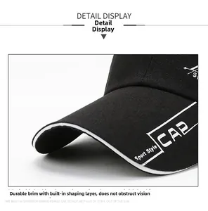 Detail view of the durable brim and stitching on this black cotton canvas baseball cap