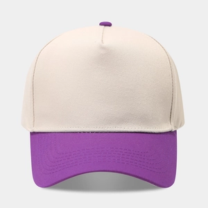 Close-up of a two-tone beige and purple five-panel cotton twill baseball cap