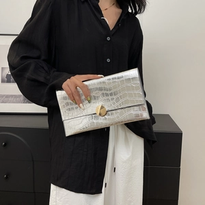 Silver crocodile embossed envelope clutch bag with golden metal buckle for women