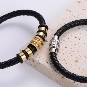 Bracciali in pelle nera intrecciata da uomo con chiusure magnetiche in acciaio inox oro e argento