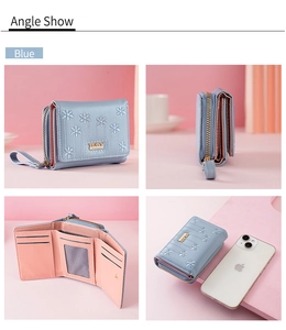 Detail view of blue PU leather wallet featuring daisy embroidery and internal card slots
