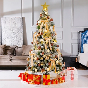 Christmas tree DIY kit with white needles, golden ornaments, and warm LED lights