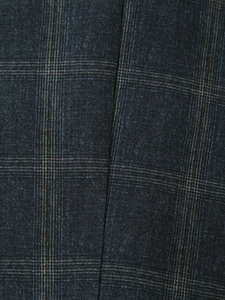 Detailed macro view of woven plaid fabric texture in dark grey and brown tones