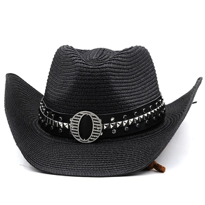 Detail of black cowboy straw hat featuring leather band with silver studs and metal buckle