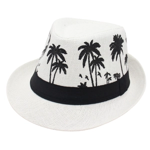 White tropical fedora with black palm tree patterns and decorative black band