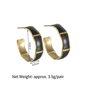 Gold-plated bamboo-shaped C-hoop earrings with black enamel, 2.3cm diameter