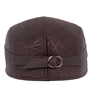 Detail of dark brown leather flat cap with cross pattern and adjustable metal buckle