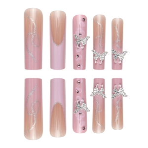 Pink coffin press-on nails featuring silver butterflies, glitter, and rhinestones
