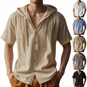 Detail of linen hooded shirt showing multiple colors including khaki and natural texture