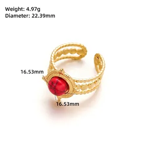 Detail view of gold titanium steel flower ring with red stone and dimensions 22.39mm