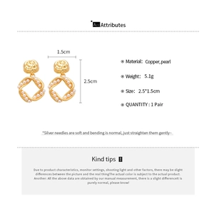Detail view of 18K gold-plated square earrings with pearls showing size and specs