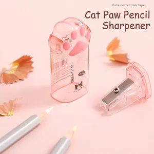 Cute pink cat paw pencil sharpener with translucent shell and meow illustration