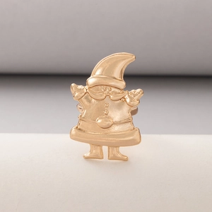 Detailed view of a golden Santa Claus alloy ring with textured metal finish details