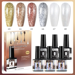 Detail of 6-piece glitter gel polish set with color swatches and salon quality box
