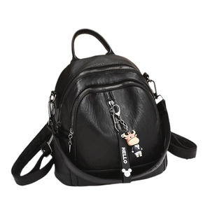 Black soft PU leather travel backpack with multi-layer zippers and cow doll charm