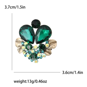 Detail view of emerald crystal flower brooch dimensions with 3.7cm height and 3.6cm width