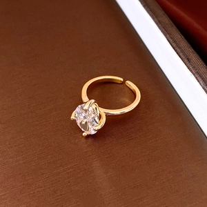 Elegant gold-plated open ring featuring a sparkling oval-cut zircon stone.