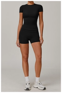 Women's black short sleeve sports top and high waist leggings for yoga and fitness