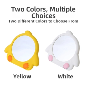 Detail of yellow and white penguin cartoon makeup mirrors with cute paw-shaped base designs