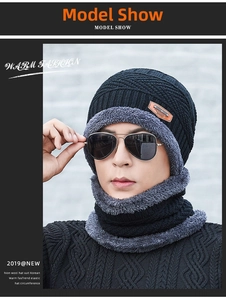 Close-up of men's winter knit hat and neck warmer with thick gray fleece lining
