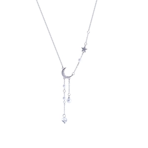 Silver moon and star tassel necklace with white pearls on a minimalist chain