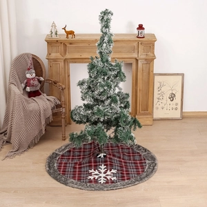 Plaid Christmas tree skirt 120cm with snowflakes and faux fur trim on wood floor