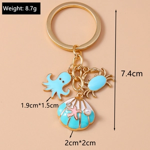 Detail of keychain with ocean enamel charms including octopus, crab and shell measurements