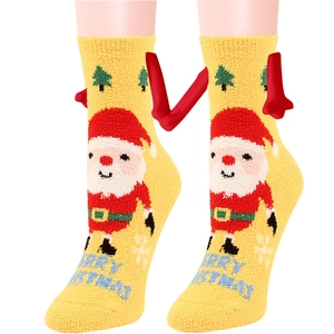 Calze di Natale in pile corallo giallo con motivo Babbo Natale e testo festivo