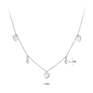 Detail view of 925 sterling silver chain with 6mm heart and 5.5mm zircon rhombus charms