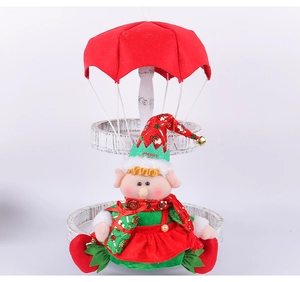 Christmas elf parachute doll on white wood tray, classic red and green festive ornaments