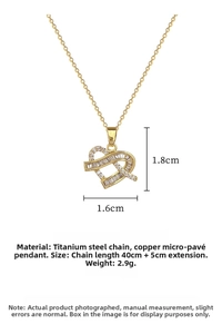 Detail view of interlocking heart pendant with zircon pavé on a titanium steel chain
