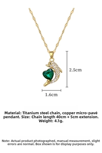 Detailed size specifications for the gold titanium dolphin necklace with green heart gem