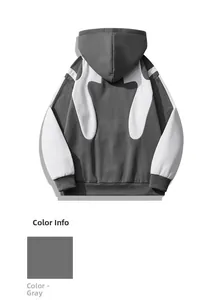 Detail eines grau-weißen Patchwork-Hoodies mit überschnittenen Schultern und Rückennaht