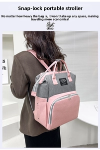 Detail of pink and gray oxford backpack with buckles for stroller hanging and water resistance