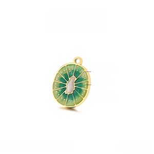 Detailed view of 14x11mm gold stainless steel kiwi fruit charm with green enamel