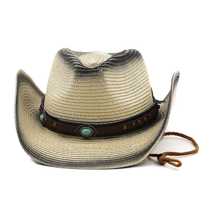 Dettaglio di cappello da cowboy vintage in paglia con fascia in pelle e pietra turchese