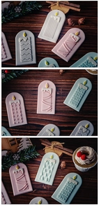 Detailed Christmas candle shaped wax melts with festive tree patterns on wood background