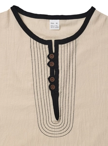 Close-up of beige linen shirt collar with wooden buttons and black decorative stitching