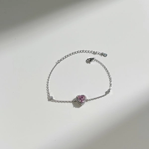 Detail of S925 sterling silver stamp on pink heart tennis bracelet with lobster clasp