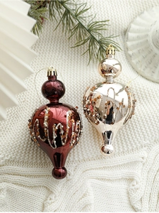 Deep red and champagne gold Christmas drop ornaments with sequins on white knit