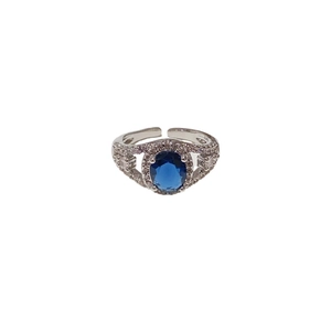 Adjustable silver ring with deep blue oval zircon and side diamond accents