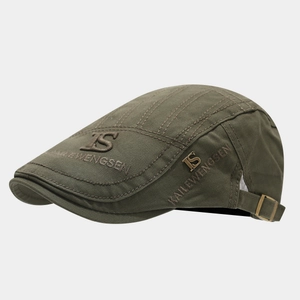 Detailed view of olive green cotton twill flat cap featuring 3D embroidery and metal logo