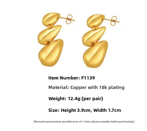 Triple-layered 18K gold plated copper teardrop earrings with dimensions and weight data